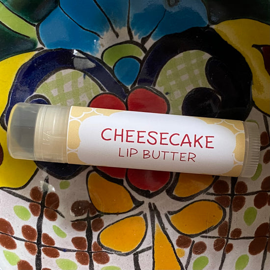 Cheesecake lip butter on a colorful ceramic plate