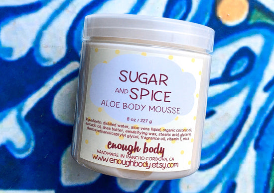 Jar of sugar and spice Aloe Body Mousse on a colorful background
