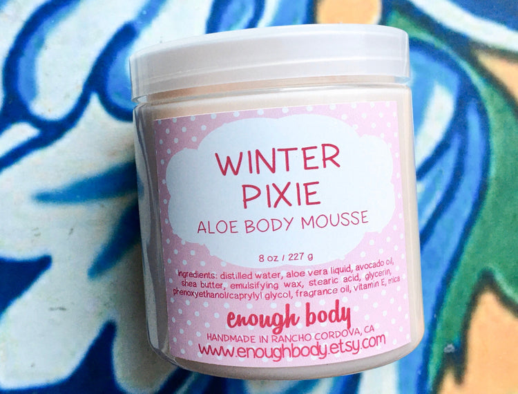 Jar of winter pixie Aloe Body Mousse on a colorful background